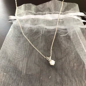 Diamond solitaire pendant